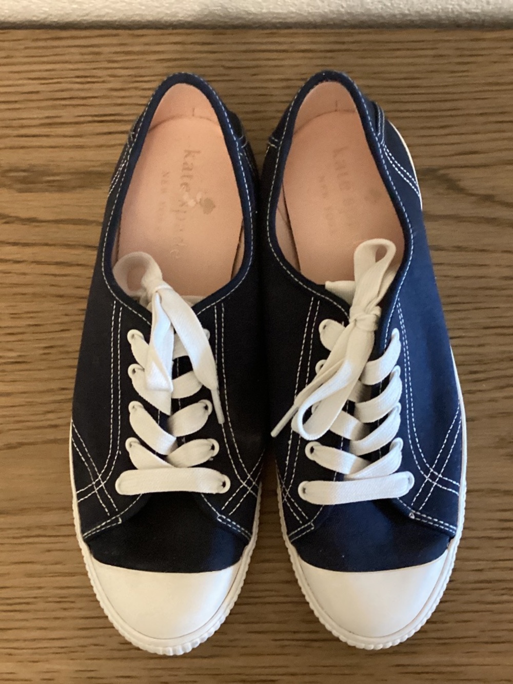 Navy Kate Spade sneaker, size 9, worn once